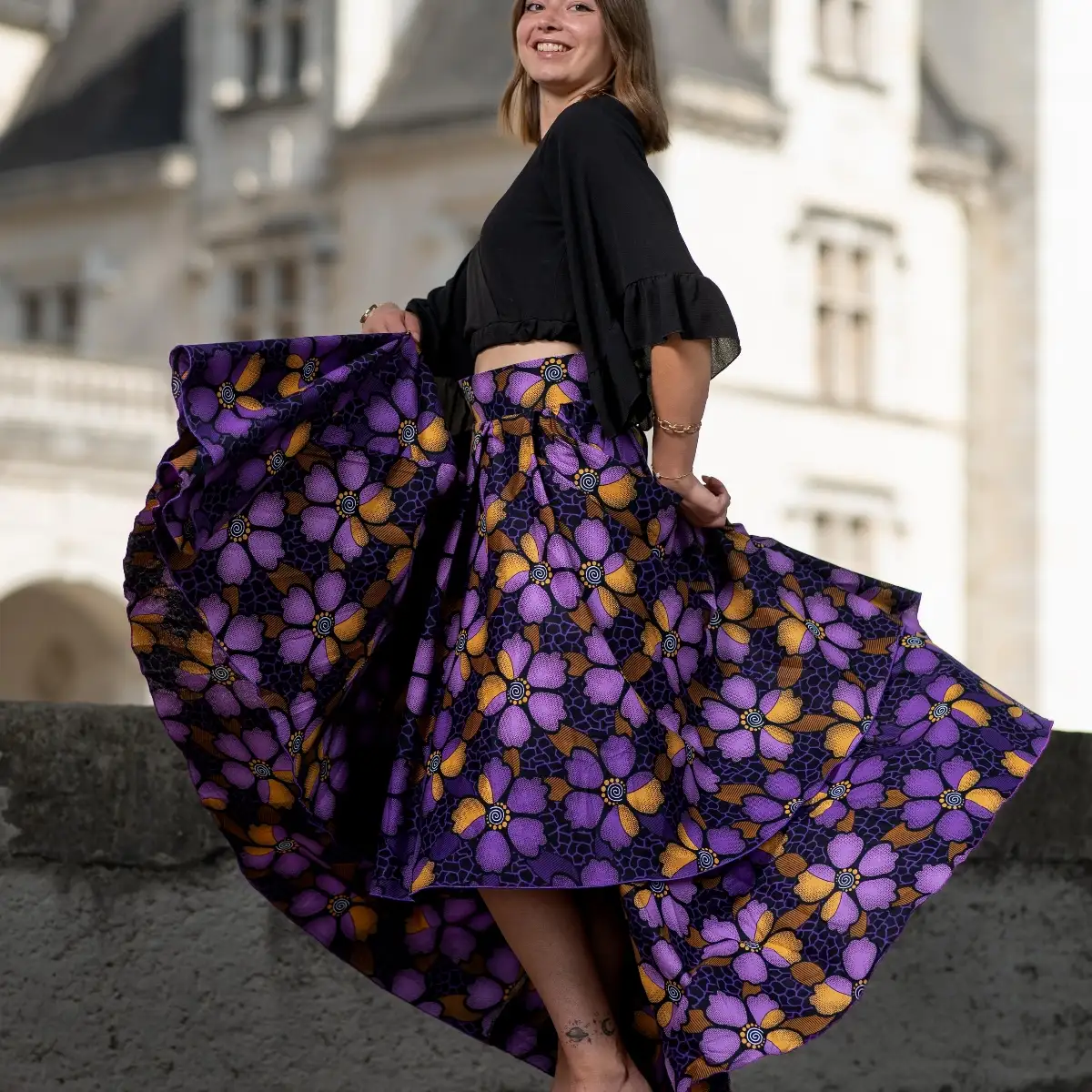 Maxi jupe violette asymétrique plissée en wax