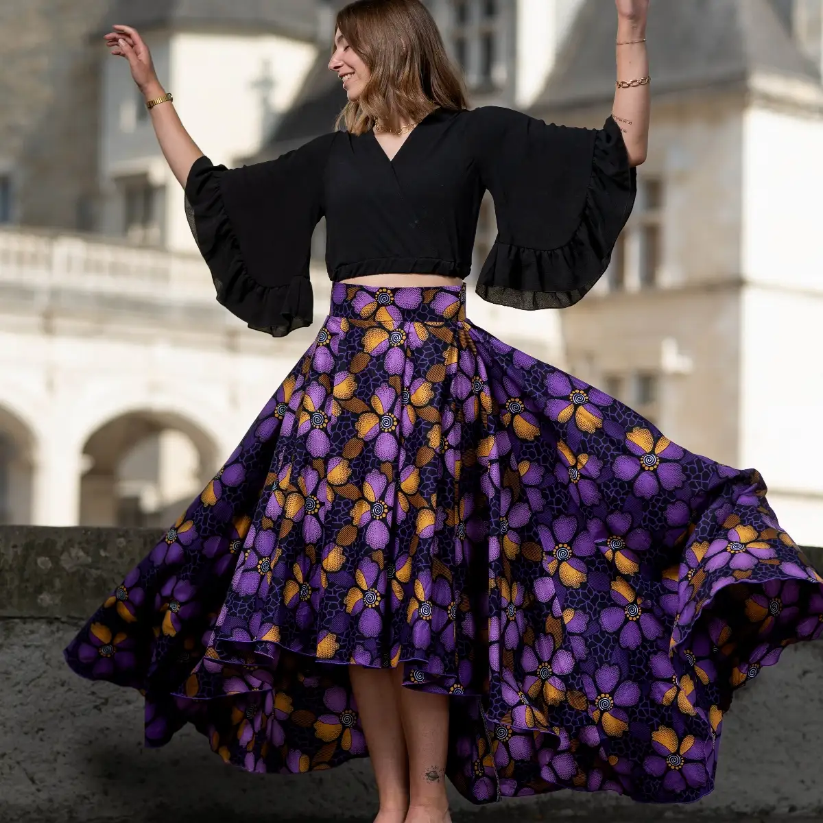 Maxi jupe violette asymétrique plissée en wax