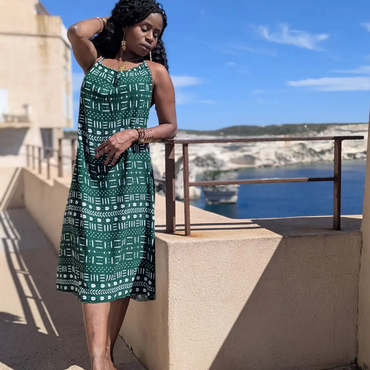 Robe dos nu fluide tissu crêpe